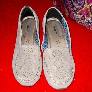 Gray Skechers loafers cut out design